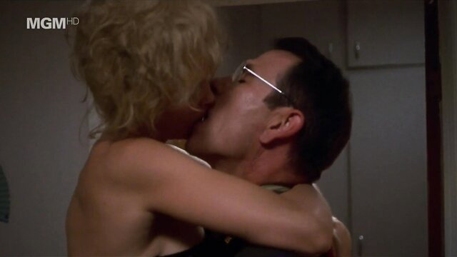Jessica Lange topless kissing man in Blue Sky 1994