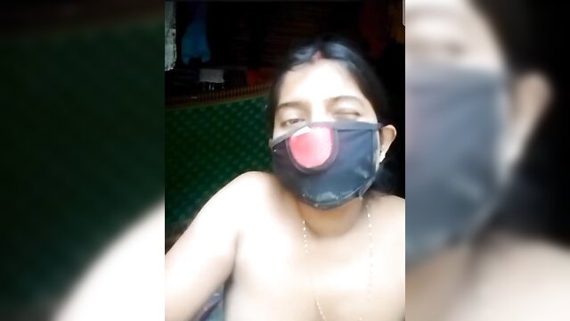 Amateur Bengali Boudi naked with clown nose mask, topless desi tits