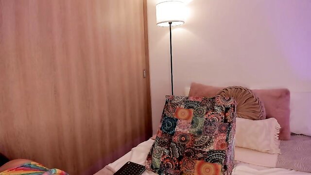 lady_lacey05 curvy Latina on bed with colorful bag, Chaturbate tease