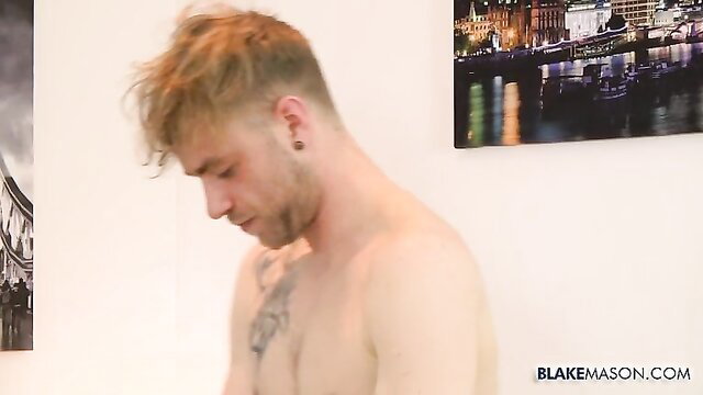 Hot ginger twink with chest tattoo poses nude on Blake Mason