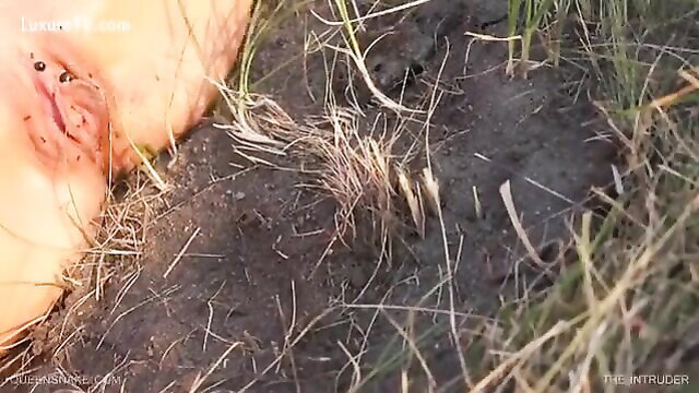 Closeup of woman's shaved pussy invaded by ants outdoors in Intruder fetish vid