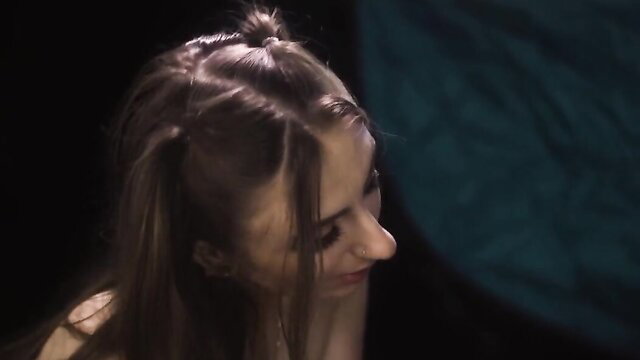 Naughty teen lesbian with pigtails smiles slyly in BBC video thumbnail