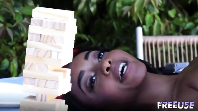 Hot ebony babe nude under Jenga tower in freeuse stepdad roleplay