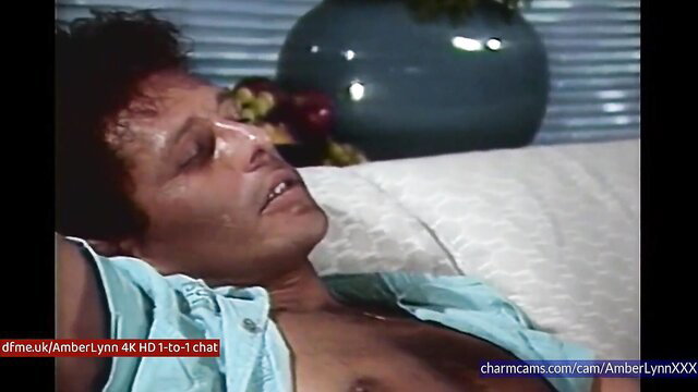 Amber Lynn shirtless man lying on couch in live cam chat