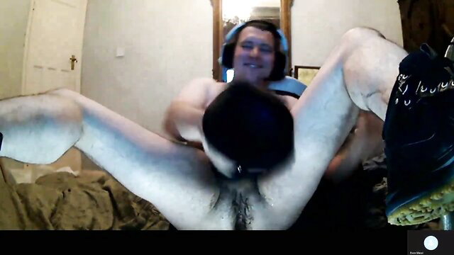 Amateur gay guy in headset gets ass fucked doggy by muscular dude