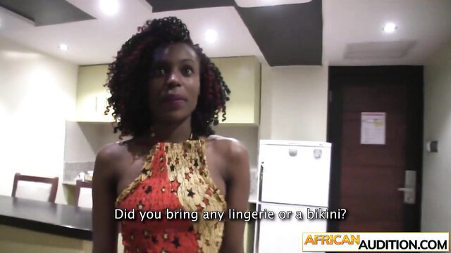 African beauty in sexy dress asked if she brought lingerie or bikini