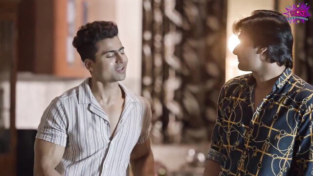 Two cute young Indian desi guys in shirts flirting intimately