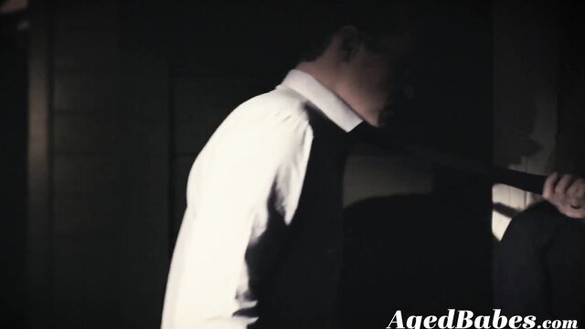 Nina Hartley in white shirt and tie seduces young guy, AgedBabes