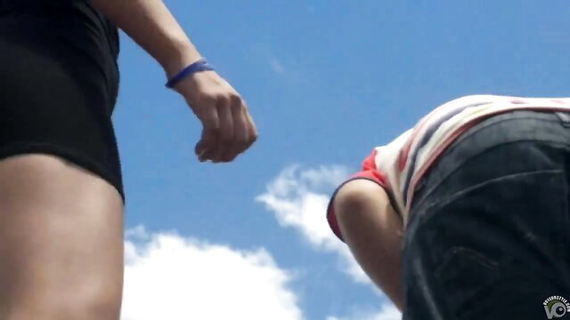 Curvy lady in black miniskirt reveals panties, upskirt view