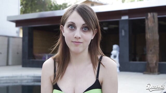 Young eager starlet in green bikini by pool, big tits teasing