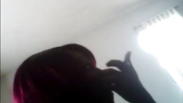 Silhouette of black ex-gf Tamika on phone call, shadowy tease