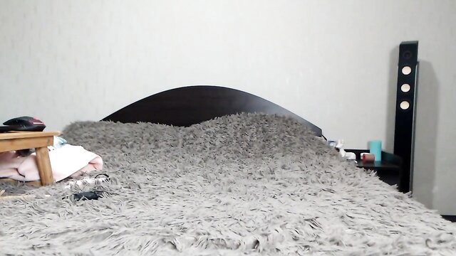 Teen with big natural tits on fluffy bed