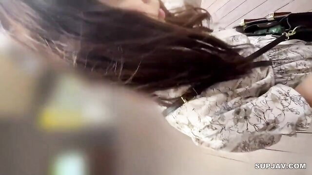 Asian beauty in floral dress with long dark hair POV closeup