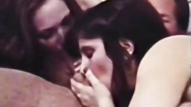 Vintage brunette deepthroating cock in closeup blowjob loop