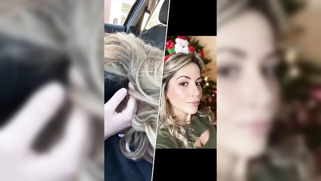 Blonde bombshell in green dress with Santa hat, teasing car selfie