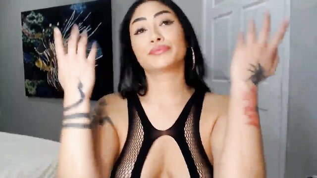 Tattooed Asian camgirl Lu in sheer lingerie poses seductively