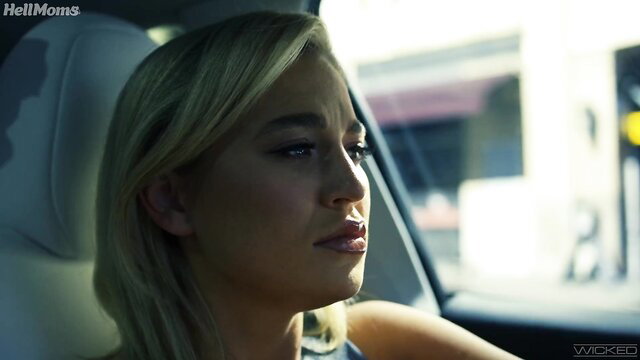 Jennifer White blonde in car, upset expression, MILF Moms scene