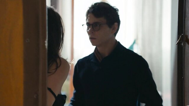 Marie Gillain in Valentin Valentin, topless at door in lingerie