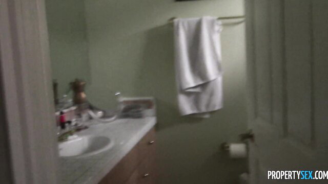 Pristine Edge in bathroom mirror, nude tits exposed, seductive pose