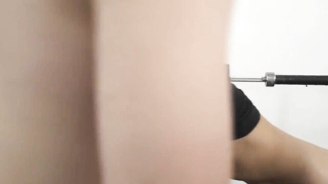 Nek Sinner's pale arm pinned, syringe injected by gloved hand in kinky scene