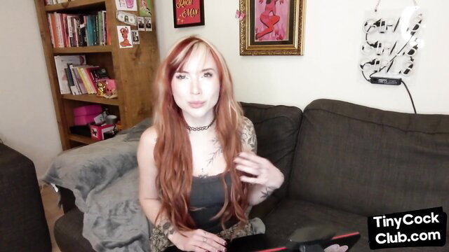 Inked redhead with tattoos teases small pathetic penises in SPH solo