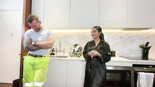 Yasmina Khan in silk robe tempts muscular workman in neon pants