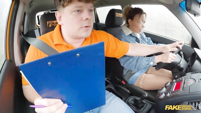Karina King as sexy cougar in fake driving school lesson