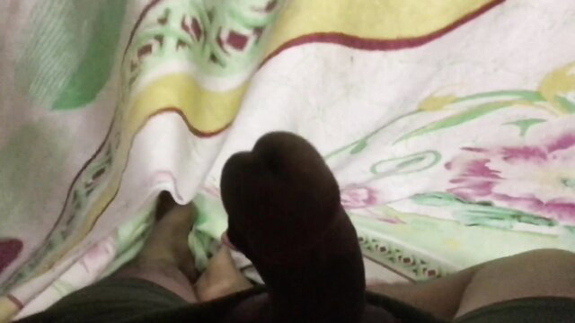 Hotjayson31 feet in black socks on bed, draining off foot fetish tease