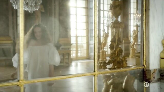 Alexia Giordano in sheer white dress at Versailles s1e1