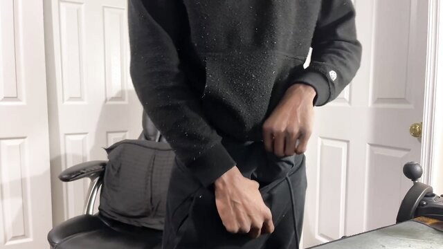 Black guy in hoodie and sweats grabs crotch in amateur tease