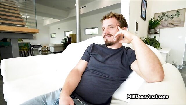 Curly-haired busty MILF Christie lounging casually before yoga assfuck