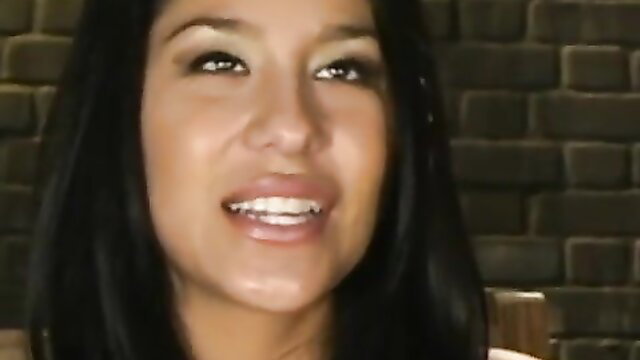 Smiling sexy brunette with glossy lips in submission scene