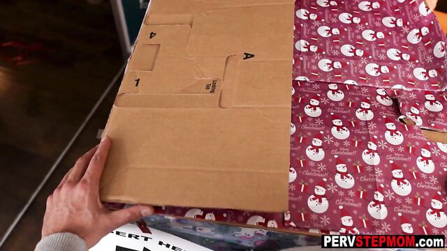 Blaire Johnson wrapping cock sucking box gift in snowman paper