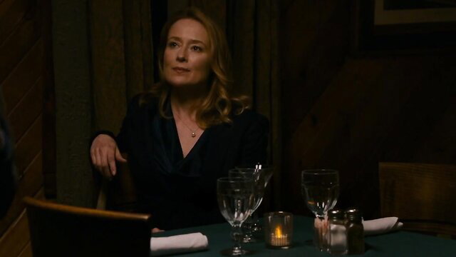 Jennifer Ehle as Kate in elegant black dress at candlelit dinner - Wetlands 2017