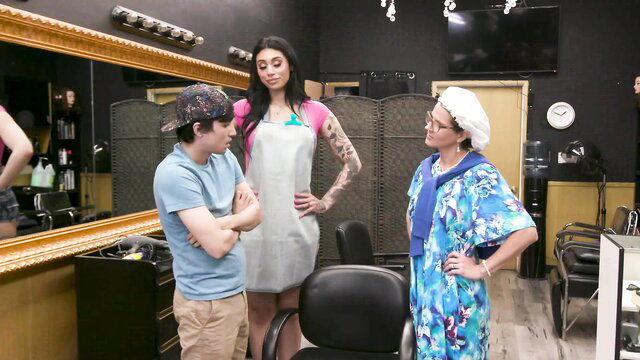 Busty tattooed hairdresser and granny with teen boy in salon