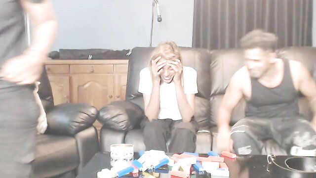 Dominate_stud bi couple: blonde girl distressed on couch with two hairy studs