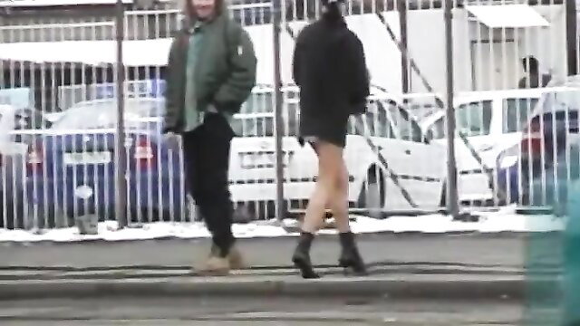 Dany diapered in public #2: woman in short skirt, black stockings, high heels outdoors