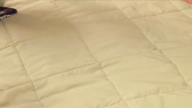 Annabelle Lee and Zoe Britton on bed in lingerie