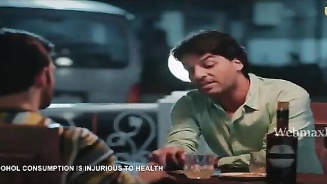 Two Indian men drinking whiskey at night in Ullu series Kaanta Laga