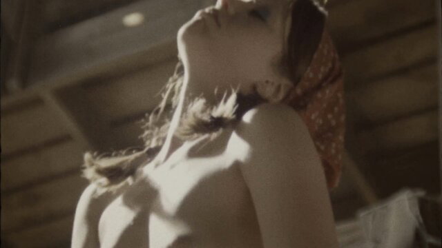 Mia Goth topless in X, nude arched back pose with headscarf
