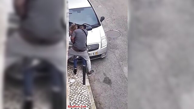 Black guy caught fucking woman doggystyle on street car hood