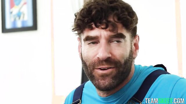 Naomi Ryder with handsome bearded man in overalls adult video thumbnail