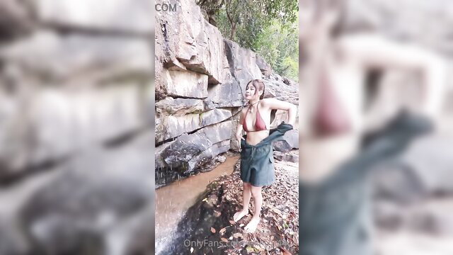Thai amateur Mintra4444 in skimpy bikini at jungle waterfall outdoors