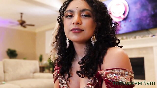 Curvy Desi Indian girl in sparkly red saree top, deep cleavage tease