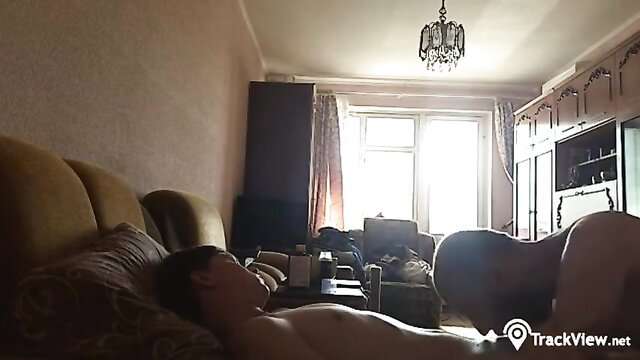 Twink lying nude on couch gets blowjob from older guy