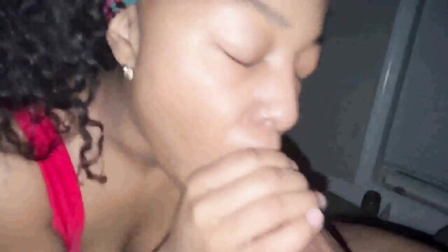 Ebony beauty with curly hair passionately kisses in steamy lesbian heat