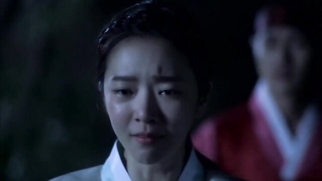 Chi Chi crying in hanbok with man in historical Korean drama scene