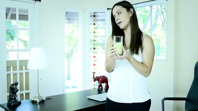 Alyssa Reece as She-Hulk holding green drink in tight white top