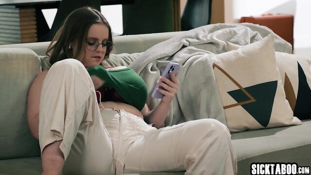 Codi Vore's huge tits spilling out in sexy pants on couch