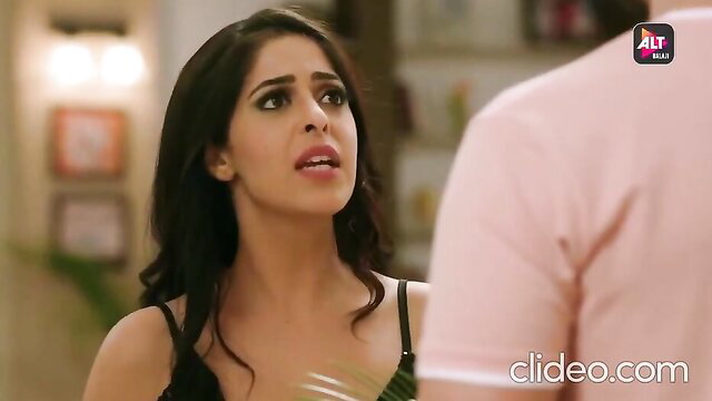 Desi Indian wife in black tank top looks shocked in erotic scene